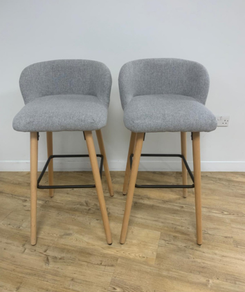 two chairs on a wood floor